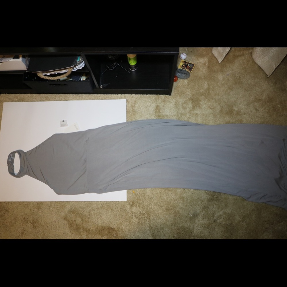 Full-length silver dress with slit